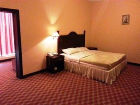 Doha Grand Hotel Habitación foto