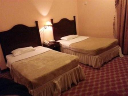 Doha Grand Hotel Habitación foto