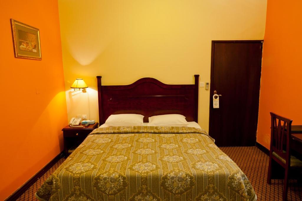 Doha Grand Hotel Habitación foto